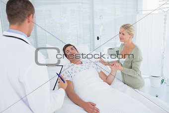 Doctor checking his patient