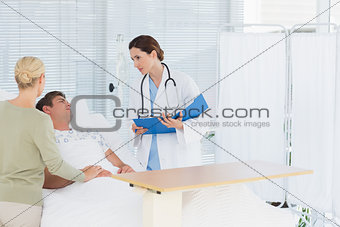 Doctor checking her patient