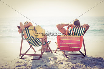 Couple relaxing on the beach
