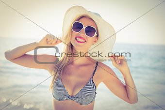 Stylish blonde on the beach