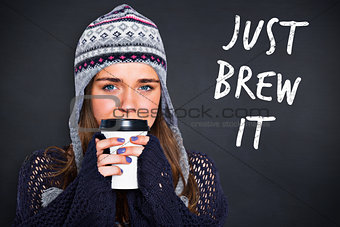 Composite image of beautiful woman in warm clothing drinking coffee