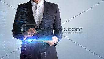 Composite image of concentrated businessman using magnifying glass