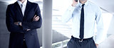 Composite image of businessman on the phone