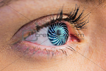 Composite image of close up of female blue eye