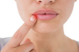 Composite image of woman pointing her lips