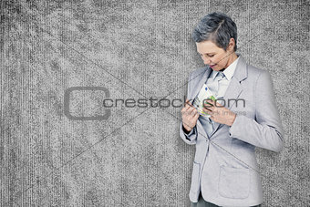 Composite image of businesswoman taking bribe