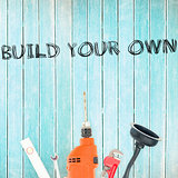 Build your own against tools on wooden background