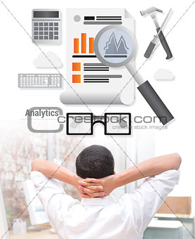 Composite image of businessman with hands behind head at desk