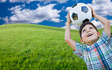 Cute Boy with Soccer Ball in Park
