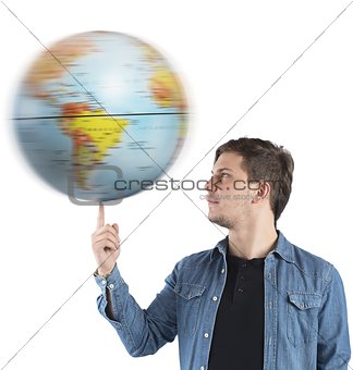 Boy turns the globe
