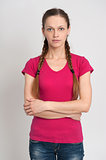 girl with pigtails wearing t-shirt