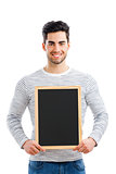 Man holding a chalkboard