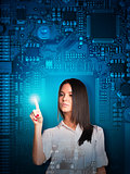 Businesswoman pressing on holographic screen