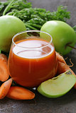 natural organic fresh juice of carrots and green apple - healthy eating