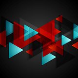 Dark tech background with red blue triangles