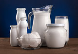 Various dairy products: cheese, sour cream, milk, yogurt, kefir.