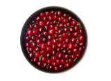 Top view of red cherry in round baking tin 
