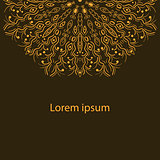 card with an ornament from autumn leaves on a dark brown background
