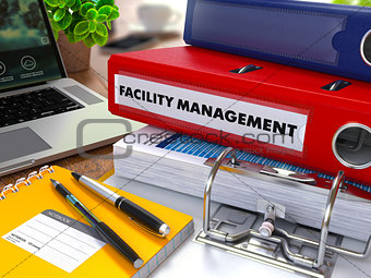 Red Ring Binder with Inscription Facility Management.
