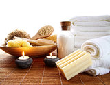 Spa accessories with candles and towels