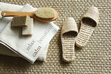 Straw slippers with spa accessories