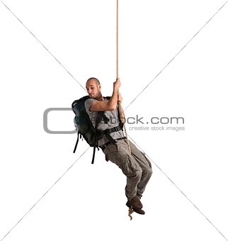 Explorer hanging from a rope