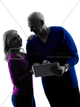 couple senior digital tablet computer silhouette
