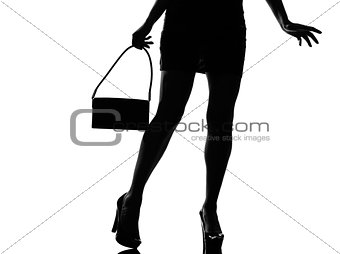 stylish silhouette woman legs walking
