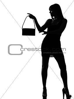 stylish silhouette woman holding purse w