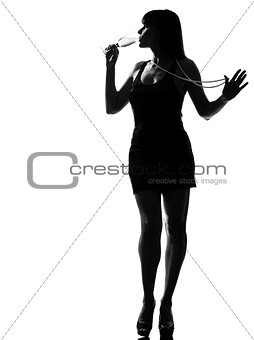 stylish silhouette woman partying drinking champagne