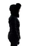 woman winter coat standing profile silhouette
