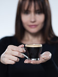 woman drinking offering coffee