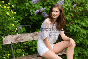 happy girl in garden in summertime 