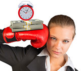 Businesswoman in red boxing gloves