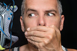 Man Covers Mouth After Smelling Shoe