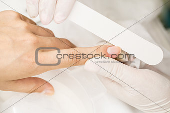 Photograph potsesse manicure in a beauty salon.
