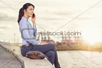 Attractive woman talking on her mobile phone
