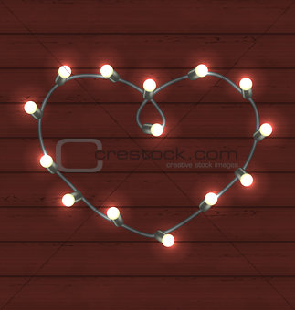 Garland heart shaped on wooden background for Valentine Day