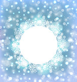 Christmas frame made in snowflakes on elegant glowing background