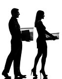 one couple man and woman walking carrying boxes happy silhouette