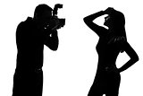 one couple man photographer and woman fashion model silhouette