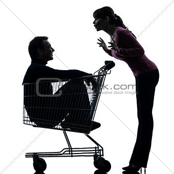 couple woman  with man sitting in shopping cart silhouette