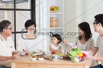 Asian Chinese family dining
