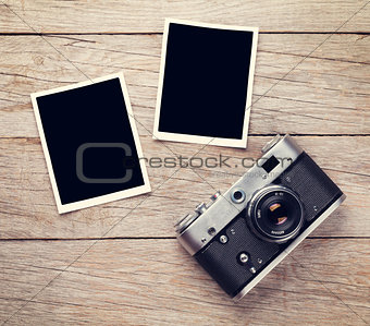 Vintage film camera and two blank photo frames
