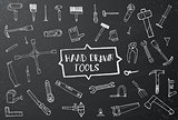 Hand drawn tool icons set on black chalk board