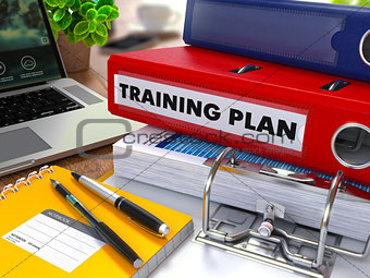 Red Ring Binder with Inscription Training Plan.
