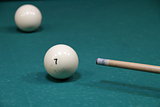 Billiard balls in a pool table in the closeup