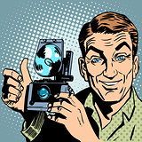 Photographer with retro camera hand gesture all is well