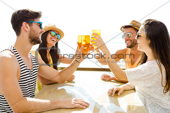 Friends drinking a cold beer