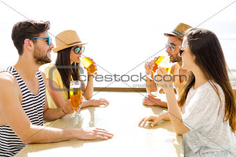 Friends drinking a cold beer